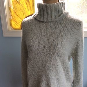 Blue and white turtleneck sweater